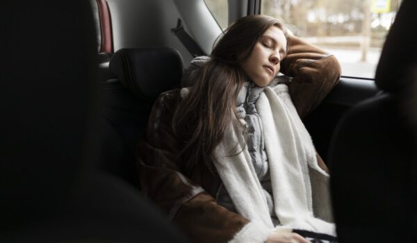 woman-resting-car-while-winter-road-trip-min-1536x1024 woman-resting-car-while-winter-road-trip-min-1536x1024